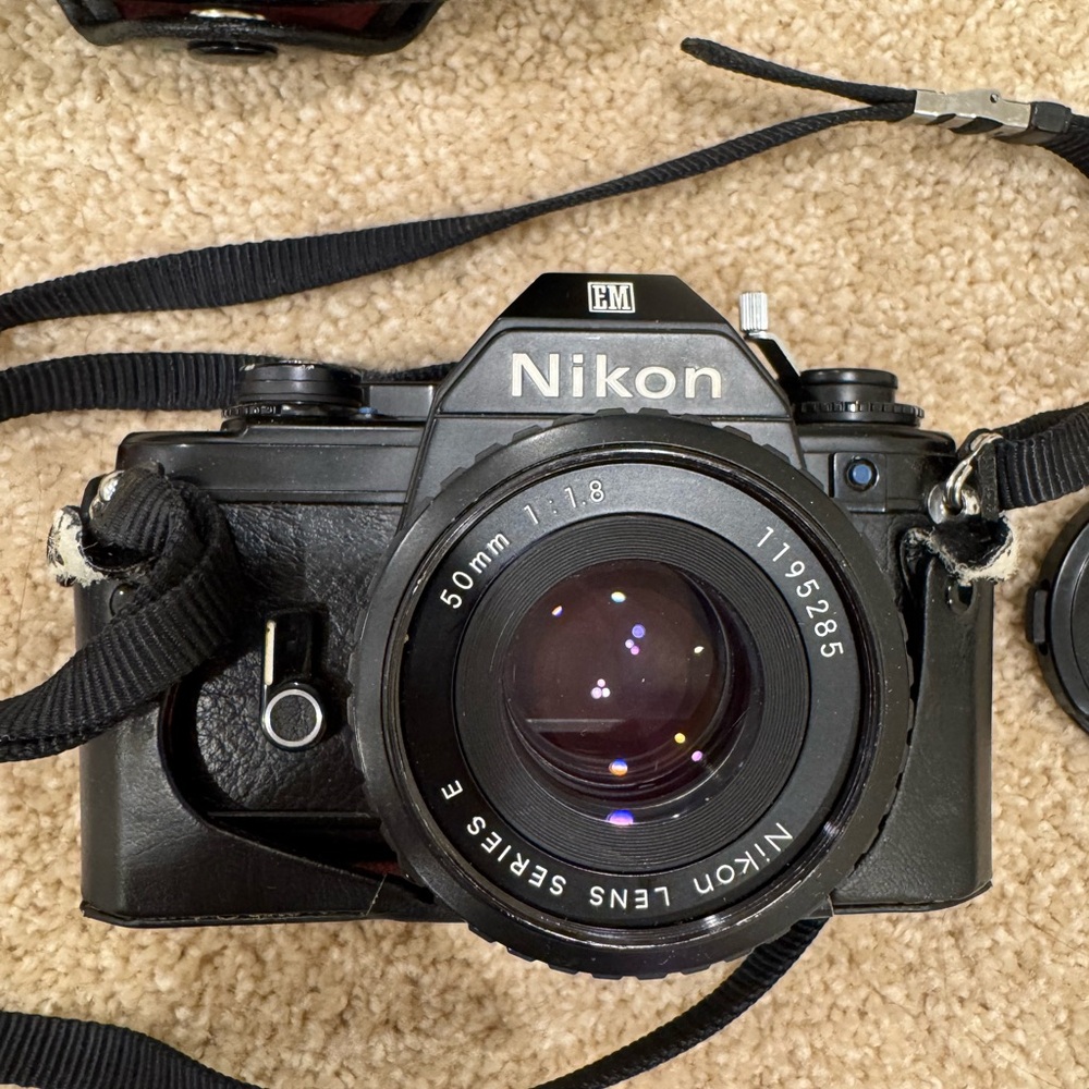 Nikon Black Professional Film Camera with Prime Lens
